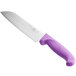 A Choice Santoku knife with a purple handle and Granton edge.
