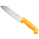 A Choice Santoku knife with a neon yellow handle.