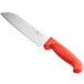 A Choice Santoku knife with a red handle.