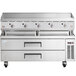 A large stainless steel Cooking Performance Group gas countertop griddle with thermostatic controls.