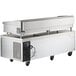 A large stainless steel Cooking Performance Group countertop griddle with refrigerated base.