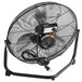 A black TPI industrial floor fan with a cord.
