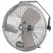 A close-up of a large metal TPI Fostoria wall-mount fan.