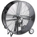 A large black TPI industrial fan on wheels.