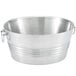 A stainless steel Vollrath beverage tub with handles.