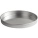 A round silver aluminum cake pan with straight sides.