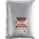 A package of Furmano's Ancient Grains Fully Cooked Red Quinoa on a white surface.