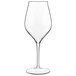 A close-up of a Luigi Bormioli Vinea white wine glass with a clear stem.
