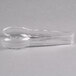 Clear plastic tongs with scalloped edges and handles.