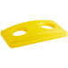 A yellow plastic Lavex Recycling Lid with two holes.