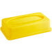 A yellow rectangular Lavex Slim Trash Can with a Drop Shot lid and oval hole.