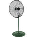 A black King Electric industrial pedestal fan on a green stand.