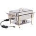 A Vollrath stainless steel chafing dish with a plug on the short side.