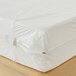 A white Bargoose queen mattress with a zipper.