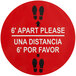 A red Tablecraft floor decal with white text and footprints reading "6' Apart Please / Una Distancia 6' Por Favor"