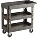 A black plastic Choice utility cart with three shelves and wheels.