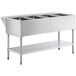 A ServIt stainless steel electric steam table with four sealed wells on an adjustable undershelf.