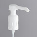 A white plastic Noble Chemical foaming soap/sanitizer pump with nozzle.