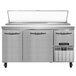A stainless steel Continental Pizza Prep Table with two full doors and one half door.