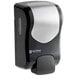 A black and silver San Jamar Summit Rely manual soap dispenser.