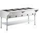 A large stainless steel ServIt liquid propane steam table with undershelf.