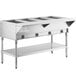A large stainless steel ServIt liquid propane steam table on a counter with an undershelf.