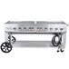 A Crown Verity natural gas portable outdoor BBQ grill with a stainless steel top.