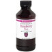 A bottle of LorAnn Oils Raspberry Super Strength Flavor liquid.