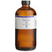 A bottle of LorAnn Oils 16 oz. All-Natural Lavender Super Strength Flavor on a counter.