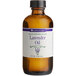 A bottle of LorAnn Oils Lavender Super Strength Flavor on a counter.