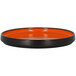 A black and orange RAK Porcelain rimless deep plate.