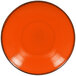 A white porcelain coupe plate with an orange center and black rim.