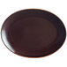 A brown oval porcelain platter with a white rim.
