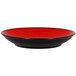 A red porcelain coupe plate with a black rim.