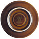 A brown porcelain saucer with a white rim.