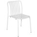 A BFM Seating white aluminum chair with vertical slats.