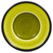 A close up of a green RAK Porcelain saucer with a black rim.