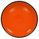 An orange RAK Porcelain stackable bowl with a black rim.