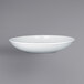 A RAK Porcelain bright white deep coupe plate with an embossed design.