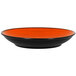A black and orange RAK Porcelain deep coupe plate.