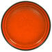 An orange porcelain bowl with a black rim.