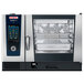 A Rational iCombi Pro full-size electric combi oven with a glass door and screen.