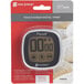 The San Jamar Escali digital touch screen kitchen timer in its package on a counter.