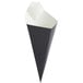 A black cone shaped container with a white paper.