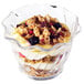 A Cambro clear polycarbonate swirl bowl filled with yogurt, granola, and berries.