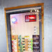 A store door with Curtron standard grade replacement strips on the sides.
