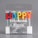 A package of 14 assorted "Happy Birthday!" candle picks with white text and bright colors.