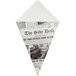 A newspaper cone folded into a triangle on a counter.