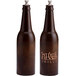 A brown beer bottle with the words "Saint Clair" on it with a Chef Specialties Beer Bottle Pepper Mill lid.