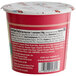 A red and white Bob's Red Mill container of Cranberry Orange Gluten-Free Organic Oatmeal.